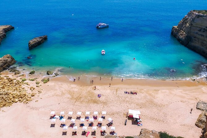 Albufeira Beach BBQ with Caves and Coastline Cruise with Open Bar - Beach BBQ on a shoreline you reach by water