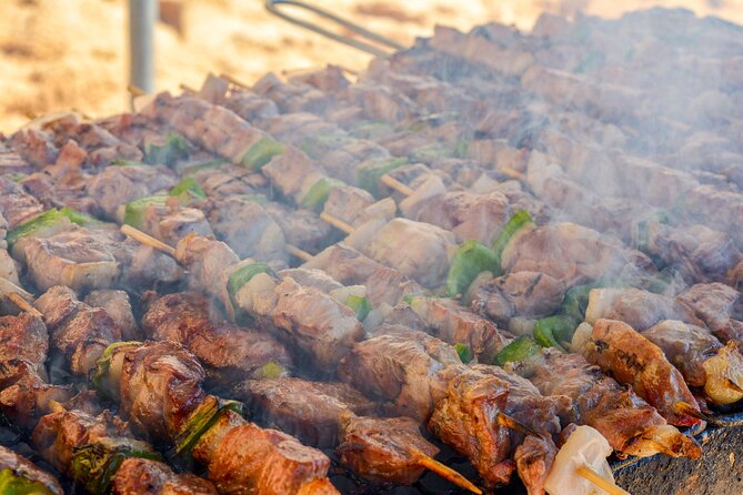 Albufeira Beach BBQ with Caves and Coastline Cruise with Open Bar - Stand-up paddleboards and beach games: turning the beach stop into real time on the water