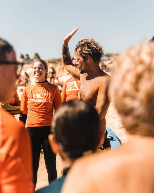 Albufeira: Beginner Surf Lesson - The 2-hour flow: warm-up, catching waves, then the pop-up