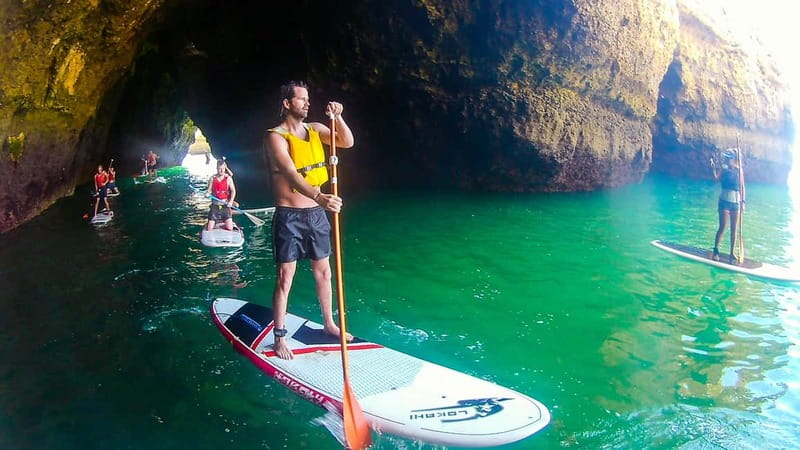 Albufeira: Caves and cliffs Paddleboarding (SUP) Tour - Choosing a guide and making the most of the photos
