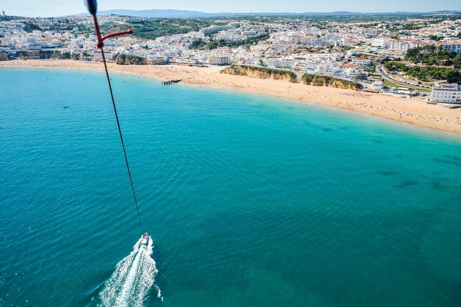 Albufeira: Single, Double or Triple Parasailing Tour - The Flight Itself: Up to 80 Meters, Slow Ascent, and Optional Water Contact
