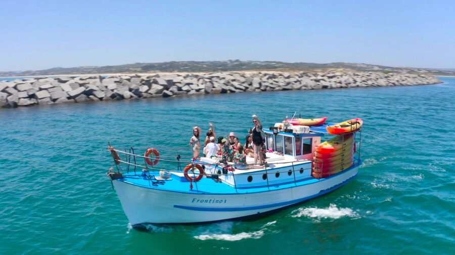 Alvor: Explore Caves Boat and Kayak Tour - Kayaking to hidden beaches and sea caves, plus that swim stop
