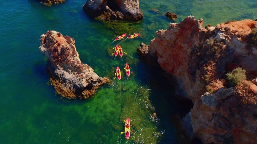 Alvor: Explore Caves Boat and Kayak Tour - The return boat cruise: bar drinks, music, and debrief time