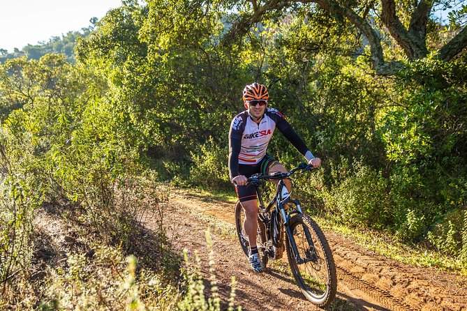 Beach and Cliffs MTB Tour - Iglesia da Senhora da Rocha, the cliff-top photo pause