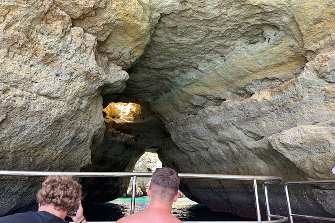 Benagil Caves & Coast from Portimão on an Eco-Friendly Catamaran - Farol de Alfanzina cave: one of the deeper stops, if conditions cooperate