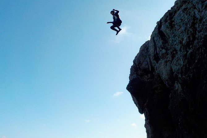 Coasteering and Cliff Jumping Near Lagos - Sea caves, hidden beaches, and marine spotting on the move
