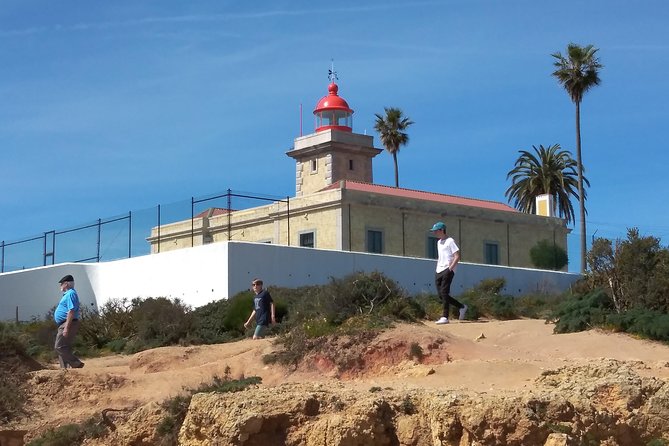 Discover Sagres & Lagos & Portimao ( Full Day Private Van Tour ) - Marina de Portimão, yachts, forts, and calm water views