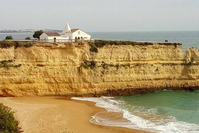 Enjoy The Algarvian Wine Taste & Coast Line Private Van Tour - Praia dos Arrifes: Three Cliffs, Caves, and a Small-Cove Feel