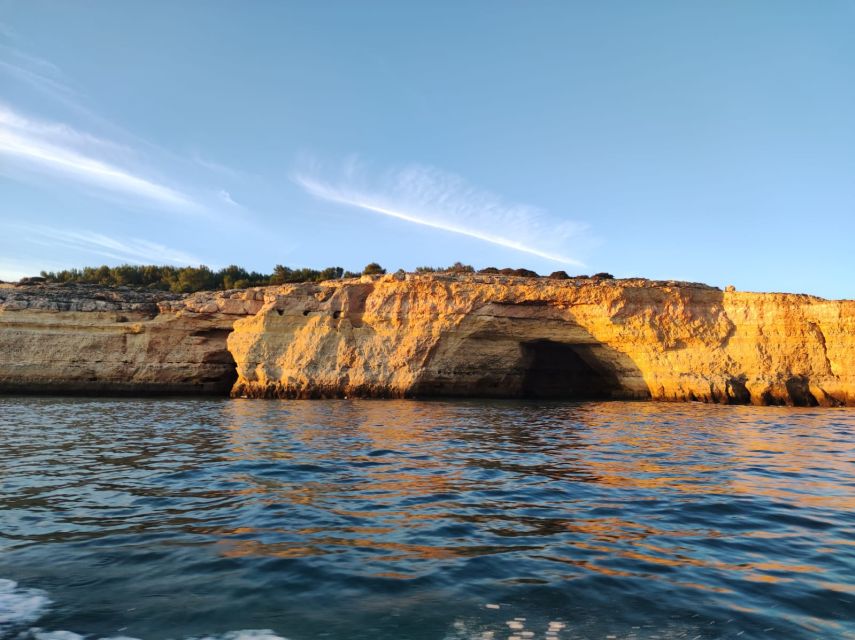 From Armação de Pêra: Sunset Benagil Caves Boat Tour - Getting onboard: small group, jackets, and a ride that stays comfortable