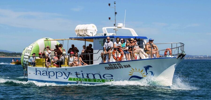 From Lagos: 2.5-Hour Guided Coastal Boat Tour & Grotto Visit - The anchor area by Ponta da Piedade lighthouse, where the tour shifts gears