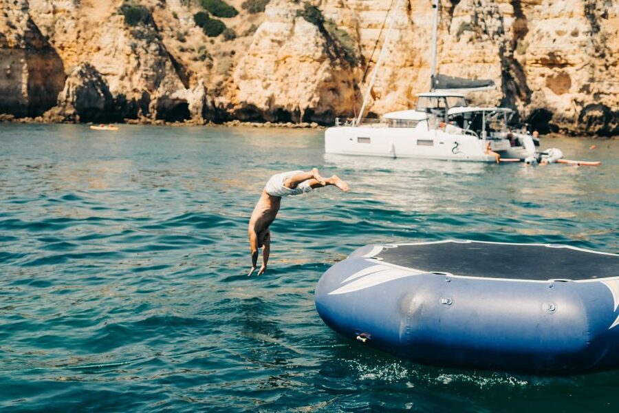 From Lagos: 2.5-Hour Guided Coastal Boat Tour & Grotto Visit - Caves in a smaller boat with Ferreira do Mar: what to expect