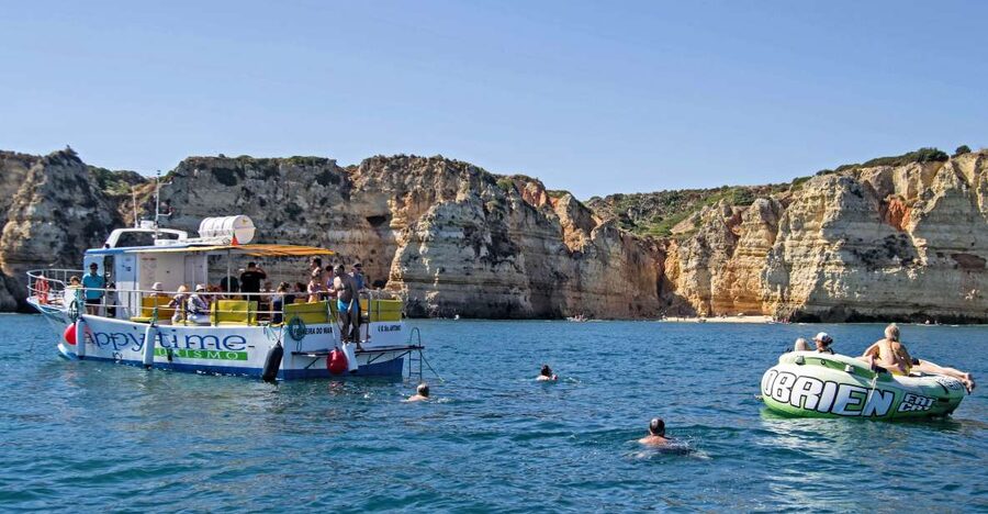 From Lagos: 2.5-Hour Guided Coastal Boat Tour & Grotto Visit - From Lagos Marina out past forts, beaches, and the slavery wall at pine beach