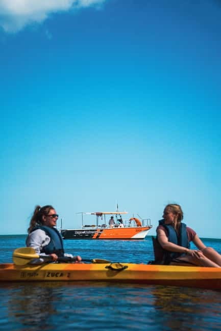 From Lagos: Ponta da Piedade Caves Kayak Tour from Catamaran - Slide into your kayak, then paddle about 1 hour and 15 minutes