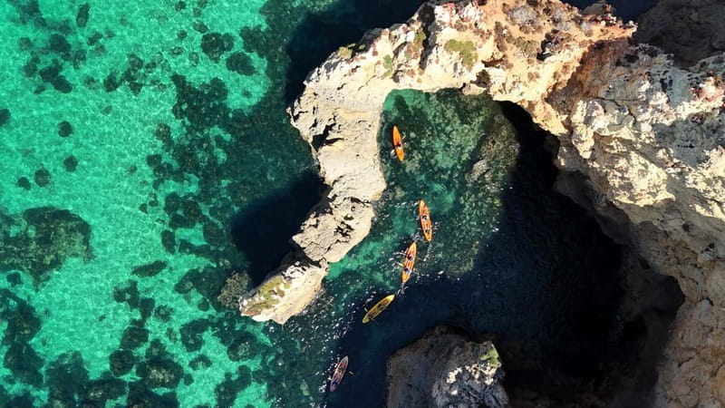 From Lagos: Ponta da Piedade Caves Kayak Tour from Catamaran - The catamaran pull-back and your short swim break