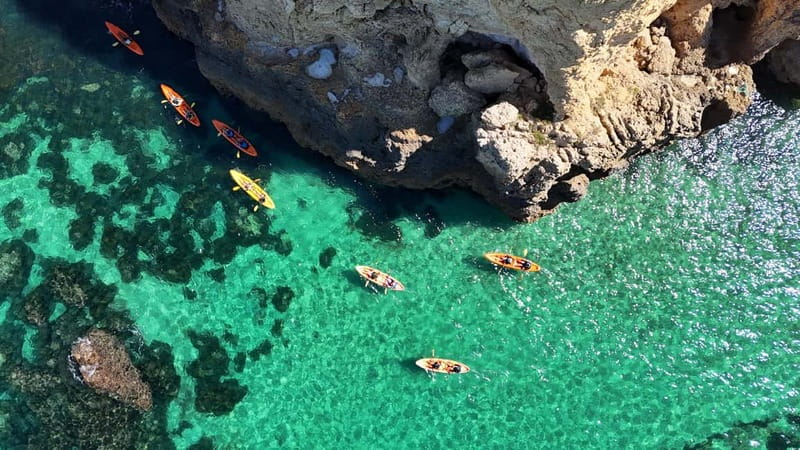 From Lagos: Ponta da Piedade Caves Kayak Tour from Catamaran - Lagos Marina catamaran ride, fast and comfortable