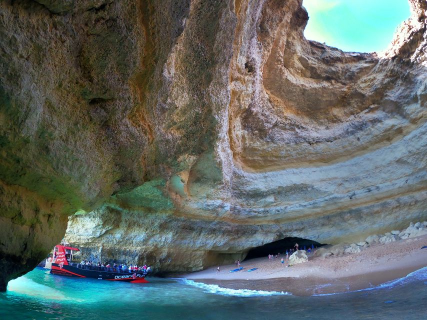 From Portimão: 2-Hour Catamaran Tour to Benagil Caves - The end near Marinha Beach: swim time and those famous arches