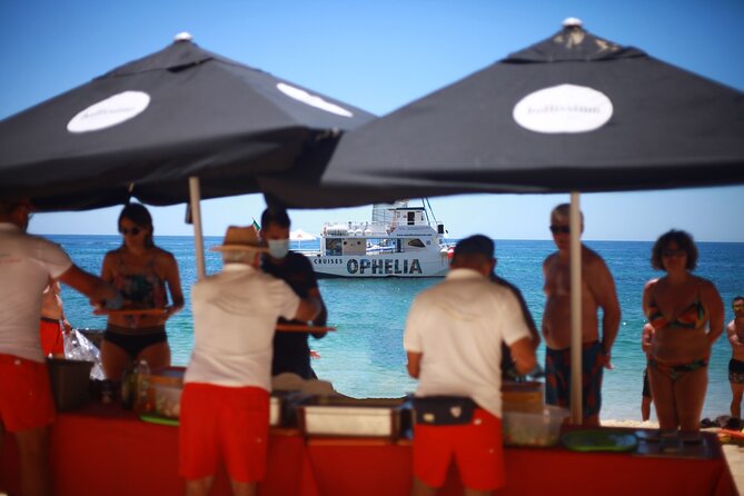 Ophelia Catamaran Cruises + Beach BBQ - Onboard comfort: Wi-Fi, restroom, and the bar you control