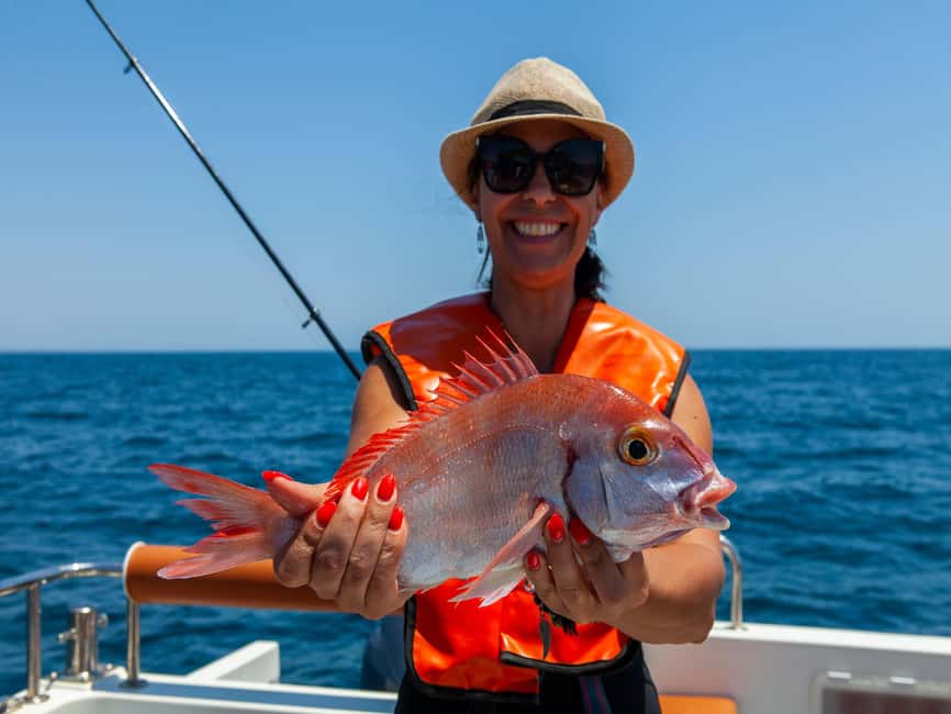 Portimão: Algarve Reef Fishing - Anchoring About 5 Kilometers Out and Casting Bait Into Algarve Waters