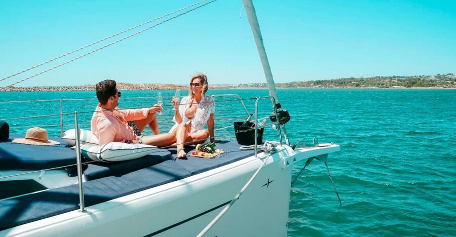 Portimao: Half-Day Sailing Yacht Cruise to the Benagil Caves - Swim breaks and paddleboards: when you actually get in the water
