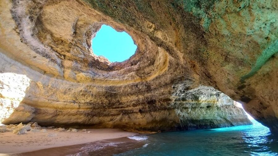Portimão: Private Boat Trip to Benagil Caves - Praia da Marinha swim stop, turquoise water and a better kind of beach time