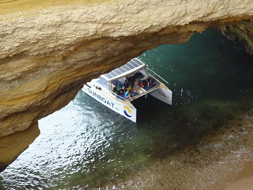 Portimao: Summer SUNSET Benagil Caves Tour | Eco Catamaran - The Eco Catamaran Experience: Comfort, Bar, and Sea Time
