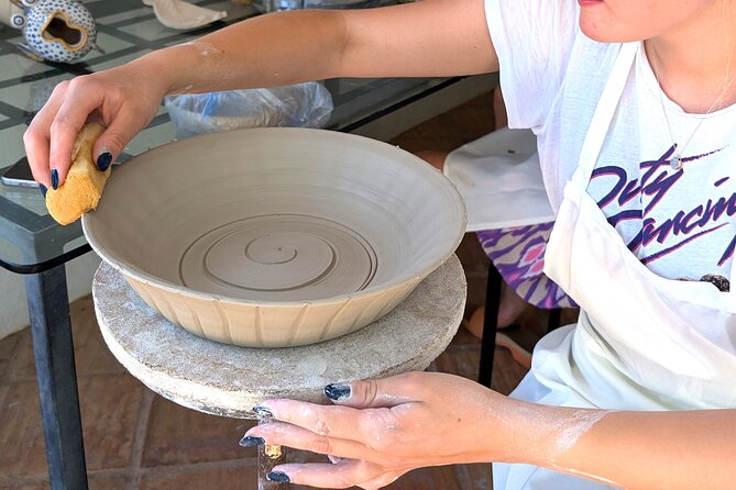 Pottery workshop in the Algarve - Jose and Francisco teach the wheel: centering, shaping, and staying calm with wet clay