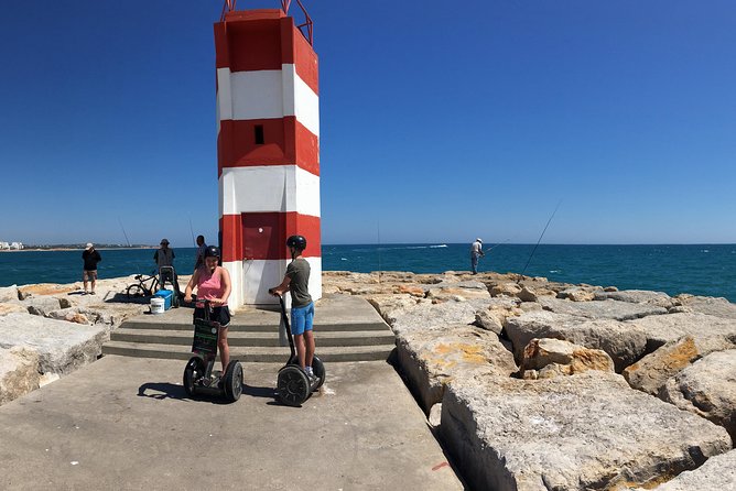 Quarteira and Vilamoura Seaside Segway Tour - Vilamoura Marina: yachts, luxury clubs, and the market vibe