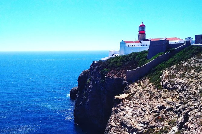 Sagres & Cape St. Vincent Half-Day Tour - Praia do Beliche: surfers, wind, and cliff-protected beauty