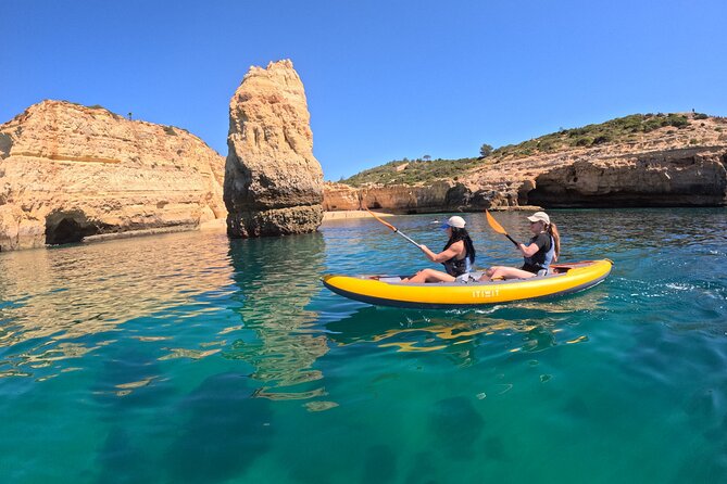 Sunrise Small Group Kayak Experience in BENAGIL Cave & 4K Photos - Praia da Marinha: paddling under arches, then photo stops