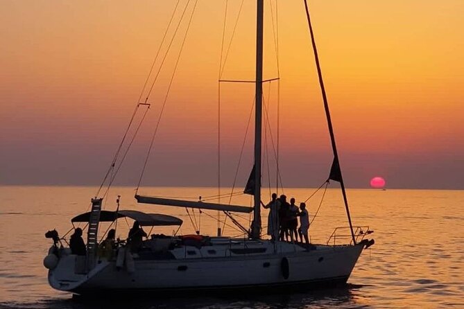 Sunset Tour on a Luxury Sailing Yacht from Vilamoura - Stop 1: Falésia Beach, clay formations, and why going slow matters