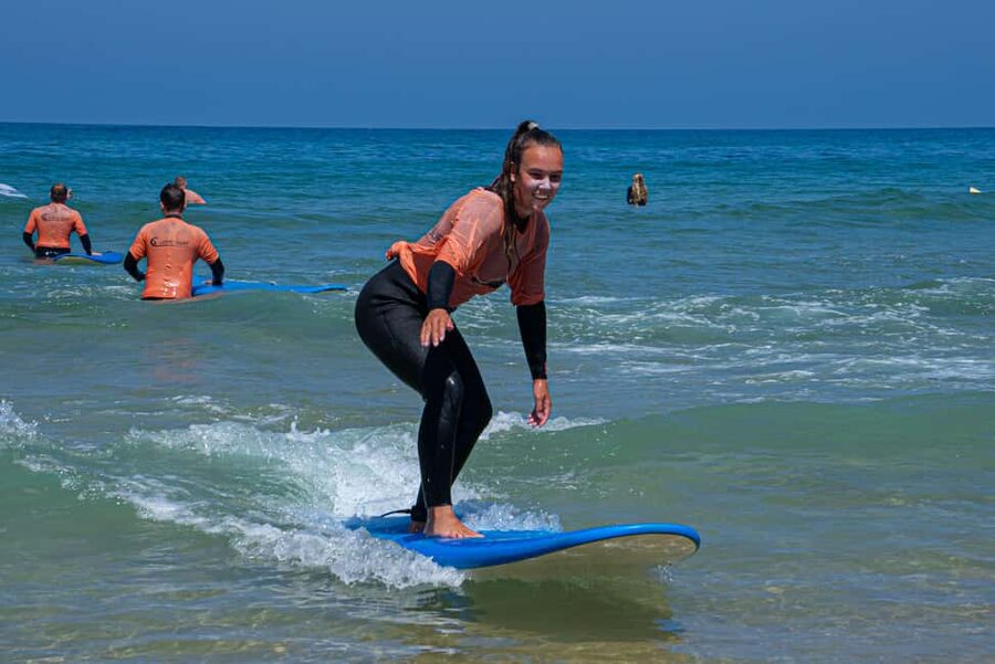 Surf Lesson Praia da Rocha - Your 90 minutes: warm-up, sand drills, then waves